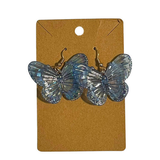 Handmade blue iridescent butterfly dangle earrings by JenDore – kawaii, anime-inspired, lightweight, and sparkly accessory
