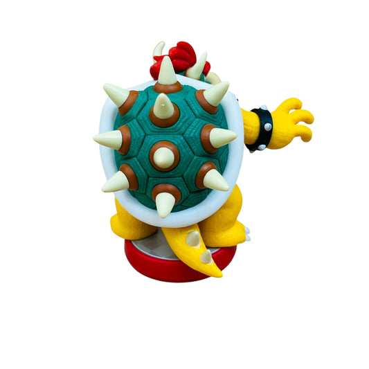 Toy figure of a character with a spiked shell on a white background