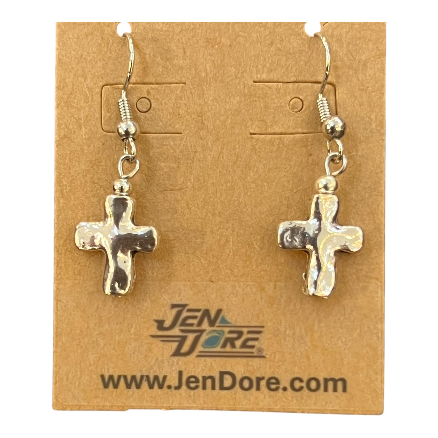 Silver cross earrings on a JenDore branded card