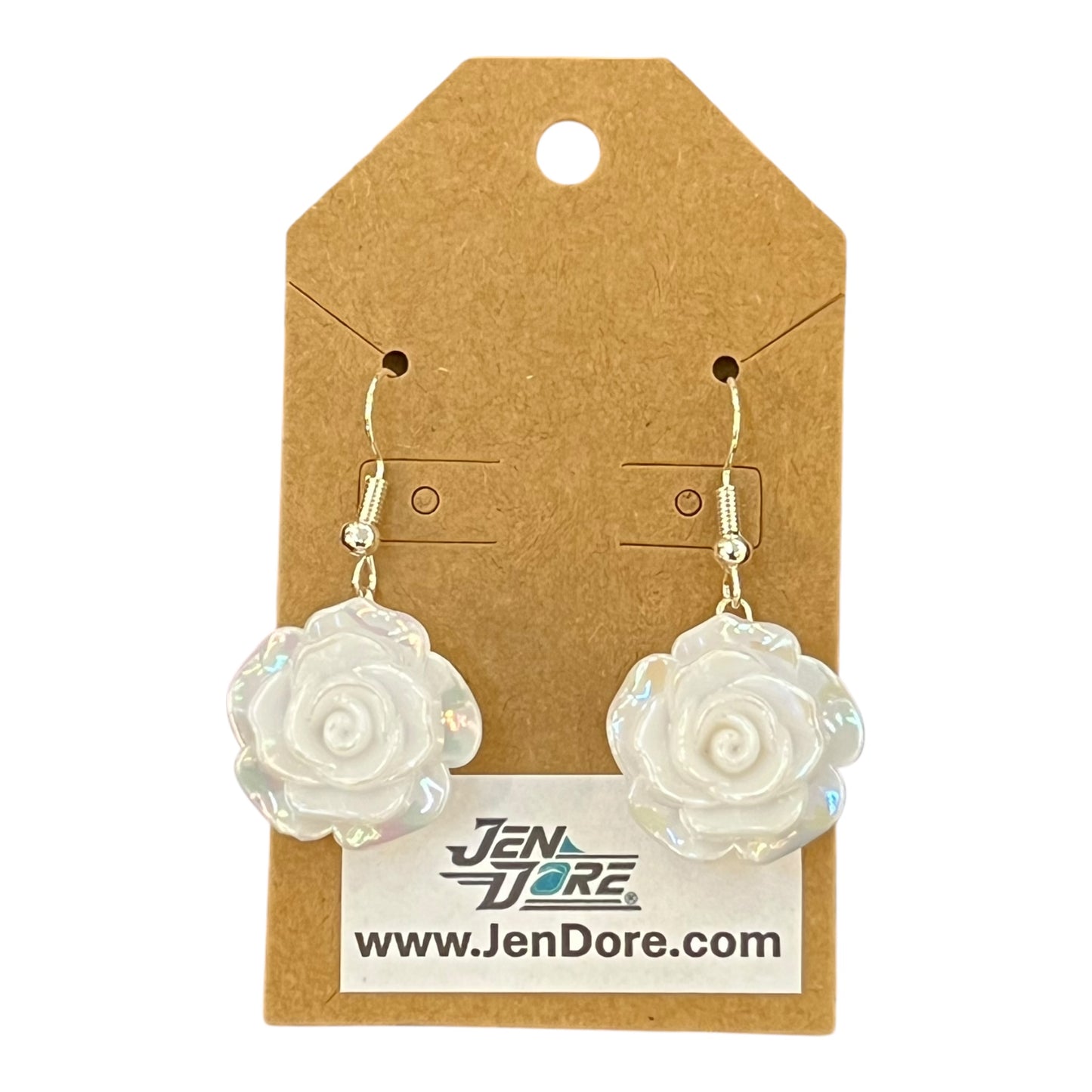 White rose-shaped earrings on a brown card with JenDore branding.