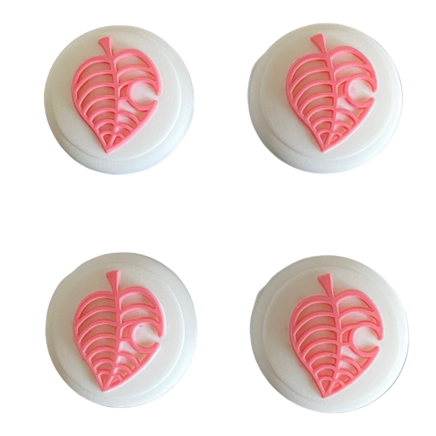 JenDore - 4 tapas de silicona para agarre de pulgar para Nintendo Switch, color rosa y blanco