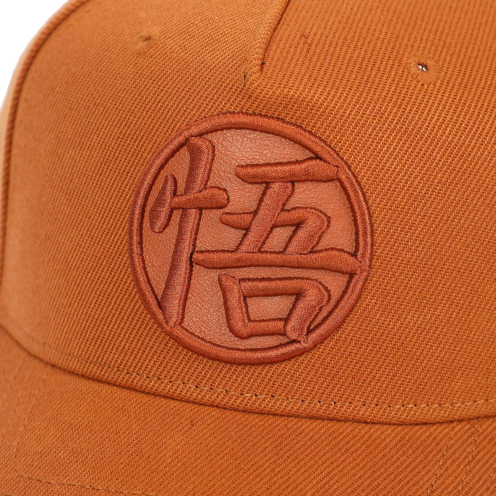 Brown cap with a circular logo featuring Chinese characters on a matching brown background
