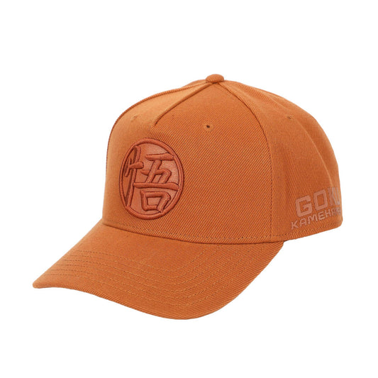 An orange baseball cap featuring a tonal brown circular emblem with a Chinese character on the front and 'GONG KAMEHAMEH' text on the side, shown against a plain white background.