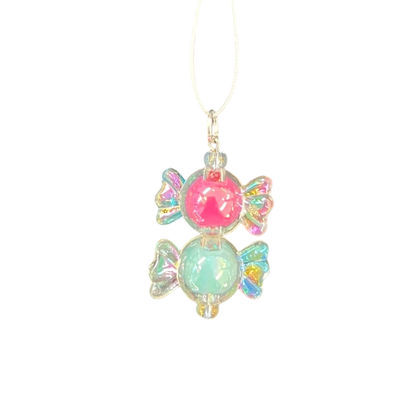 Decorative heart-shaped hanging ornament with colorful beads on a white background