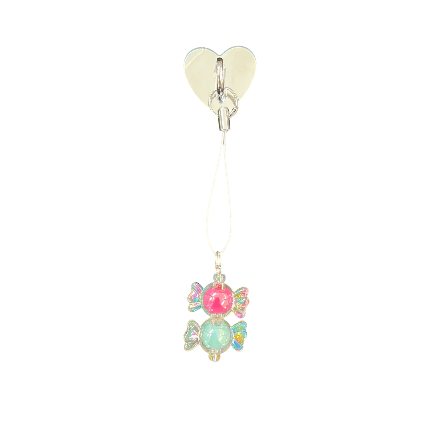 Heart-shaped clip with colorful gemstone pendant on a white background