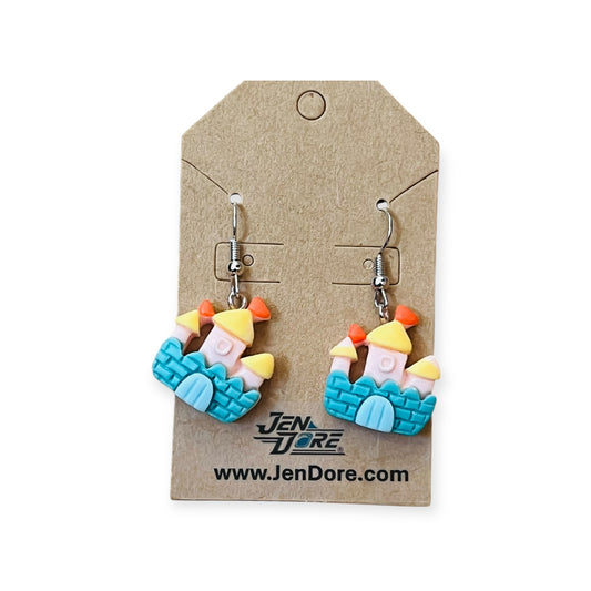 Close-up of JenDore handmade princess castle dangle earrings featuring whimsical fairytale-inspired charm and lightweight design.