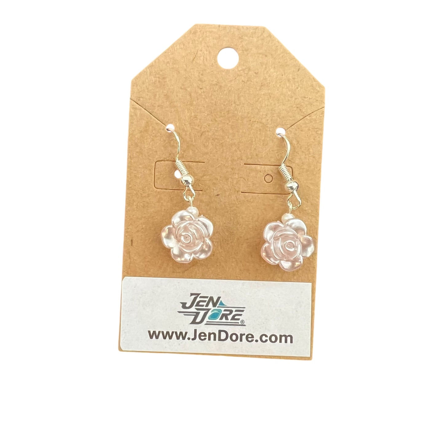 JenDore pink rose-shaped earrings on a brown card 