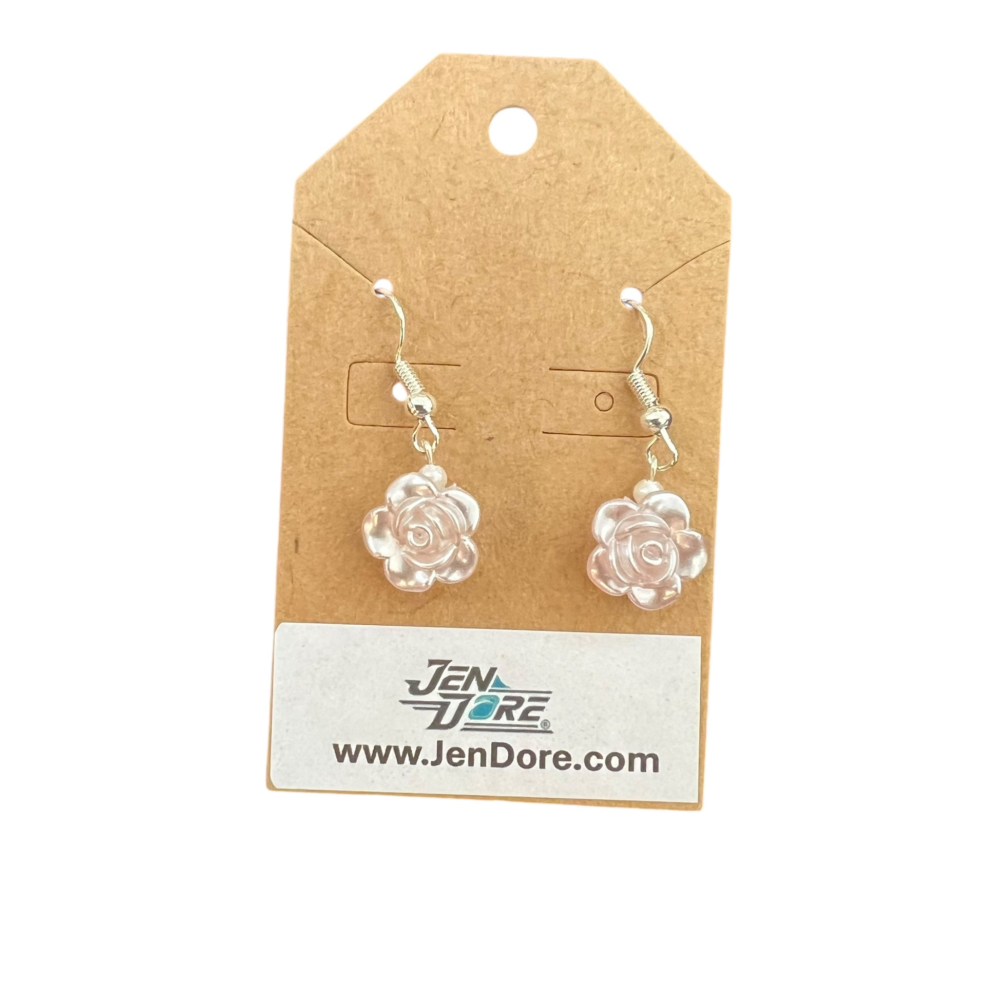JenDore pink rose-shaped earrings on a brown card 
