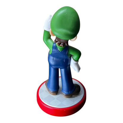 Preowned Luigi Super Mario Amiibo figurine compatible with Nintendo Switch, Wii U, and Nintendo 3DS, preowned at JenDore
